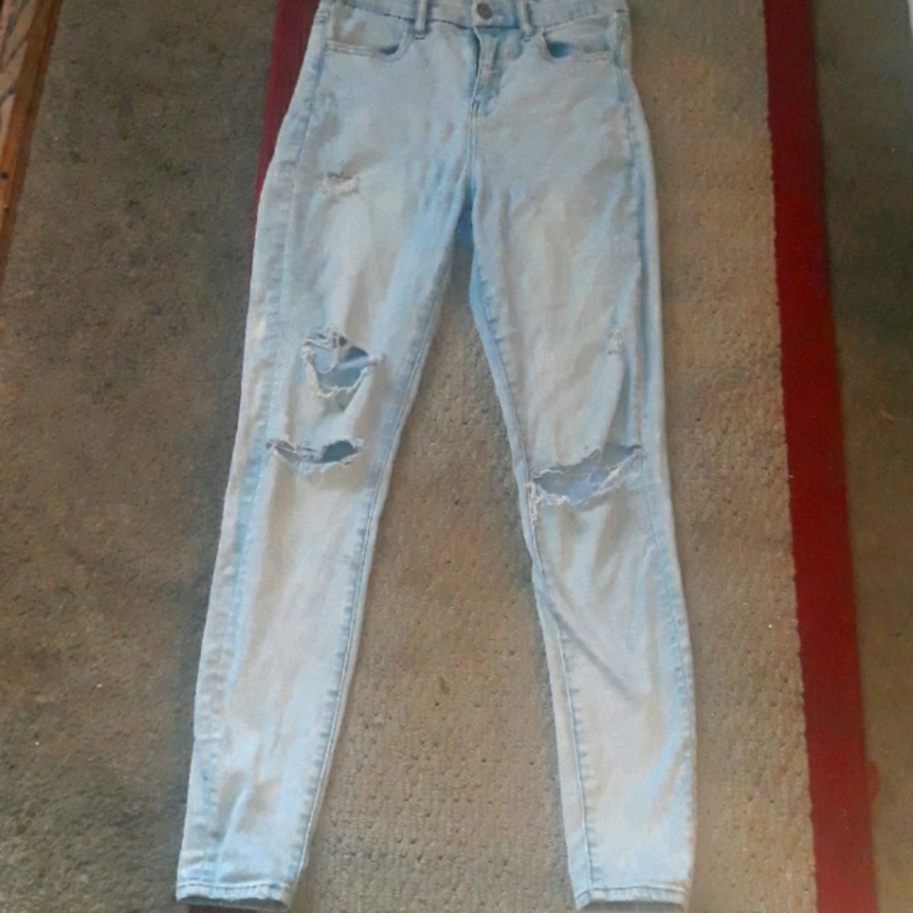 Light blue ripped jeans